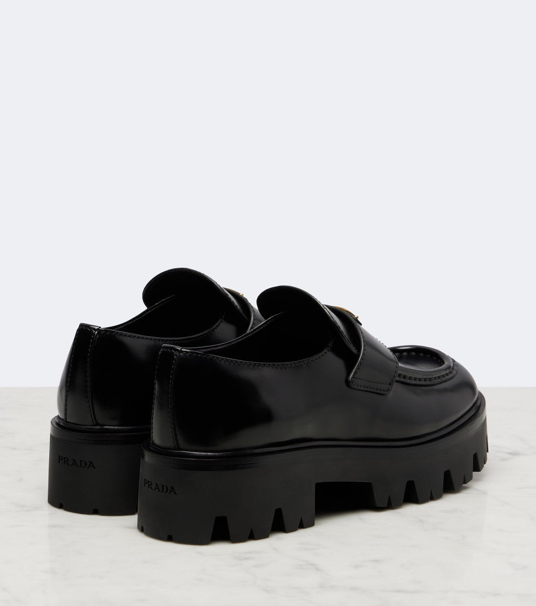 Prada - Logo leather platform loafers
