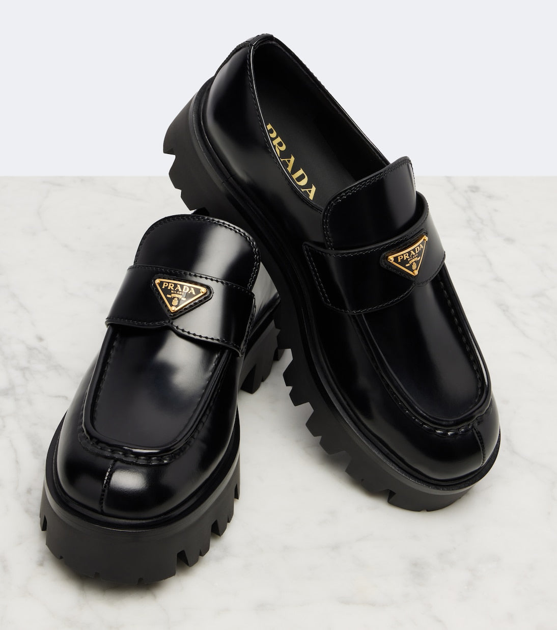 Prada - Logo leather platform loafers