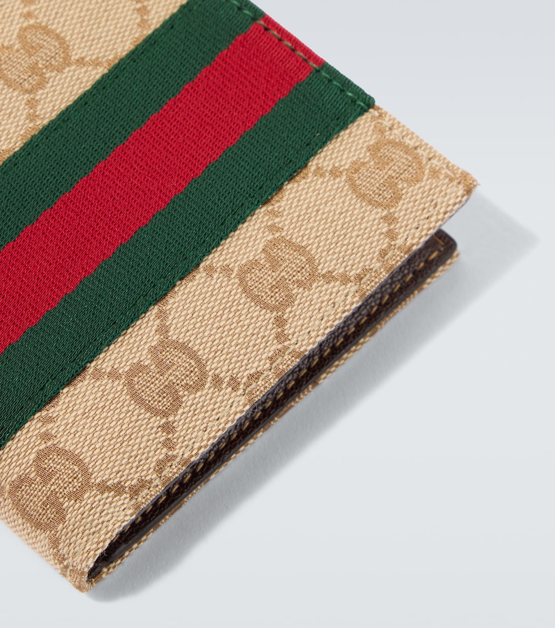 Gucci - GG Canvas Web Stripe bifold wallet