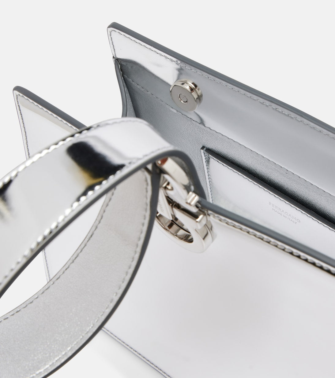 Ferragamo - Gancini Small metallic leather clutch