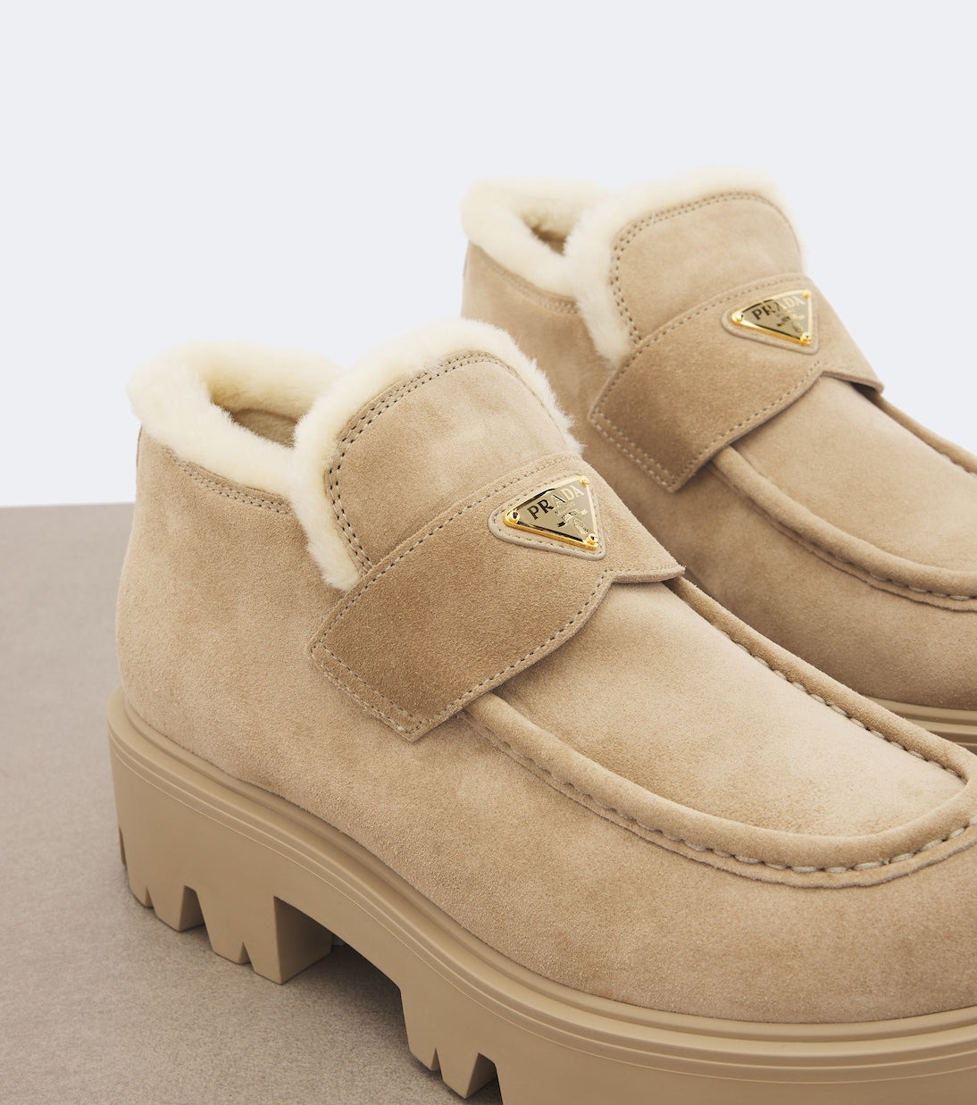 Prada - Shearling-trimmed suede platform ankle boots
